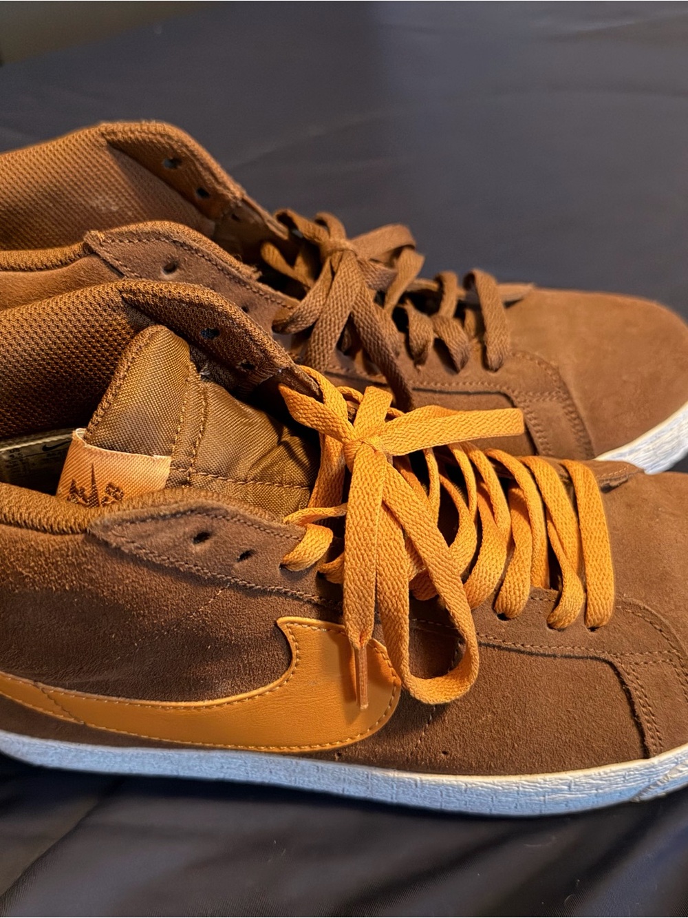 Nike SB Brown Suede Sneakers with Orange Swoosh and Laces